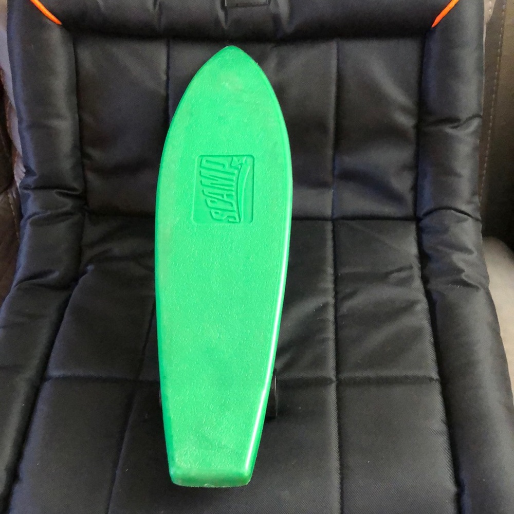 Vintage 1970s green scamp skateboard. Excellent condition.